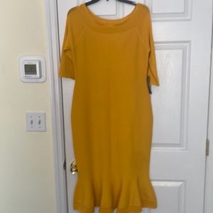 Eva Mendes yellow/gold 3/4 sleeve Knit dress with flounced bottom